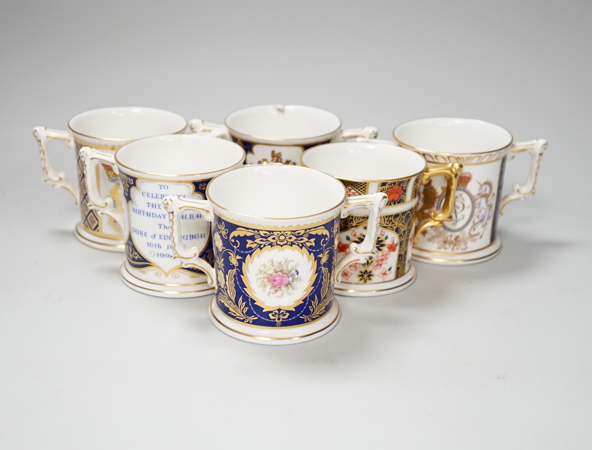 Six Royal Crown Derby Royal commemorative two handled cups